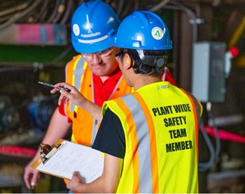 Team members wearing hard hats